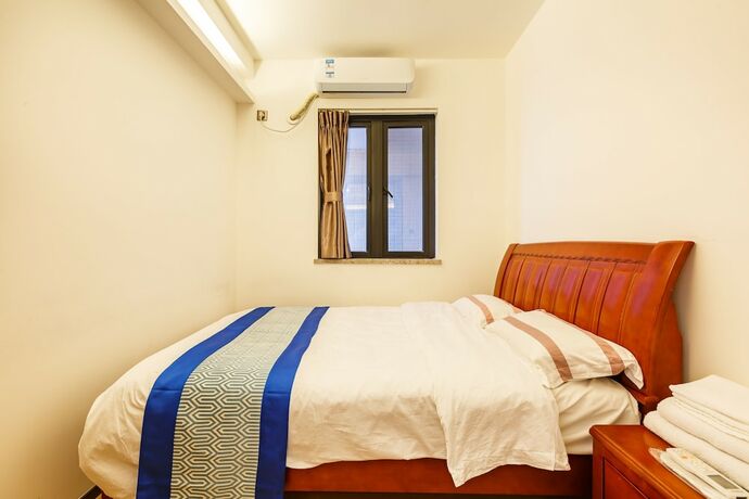 Imagen de la habitación del Hotel Guangzhou Xiwuju Service Apartment. Foto 14