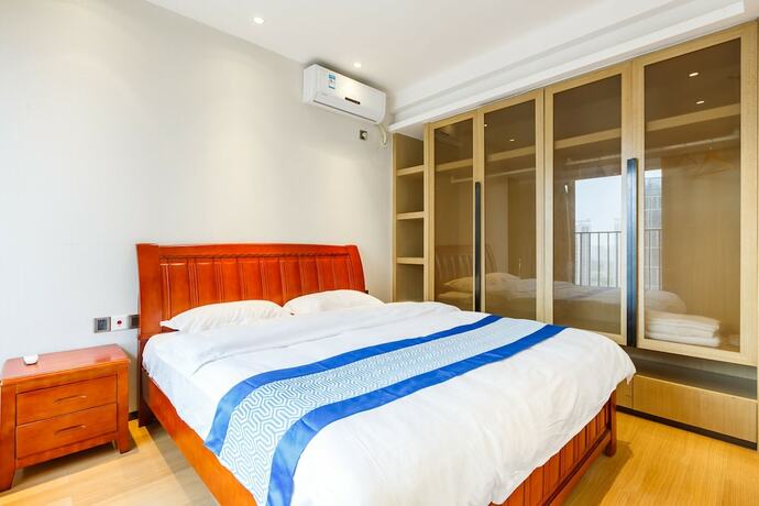 Imagen de la habitación del Hotel Guangzhou Xiwuju Service Apartment. Foto 16