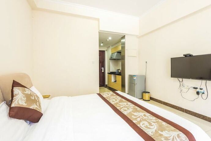 Imagen de la habitación del Hotel Guangzhou Xiyunlai International Apartment Pazhou Exhibition Center Store. Foto 23