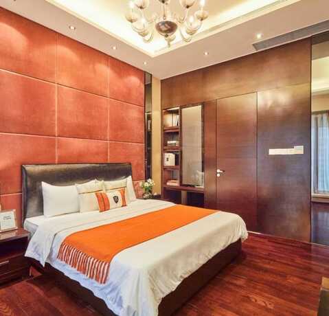 Imagen de la habitación del Hotel Guangzhou Yandw Service Apartment. Foto 11