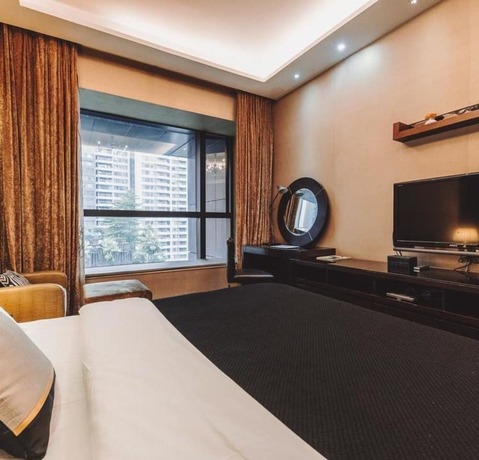 Imagen de la habitación del Hotel Guangzhou Yandw Service Apartment. Foto 12
