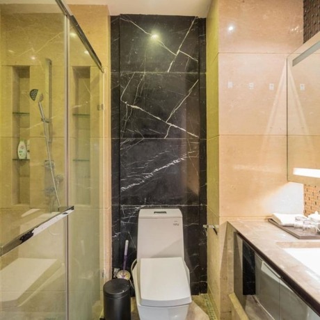 Imagen de la habitación del Hotel Guangzhou Yandw Service Apartment. Foto 14