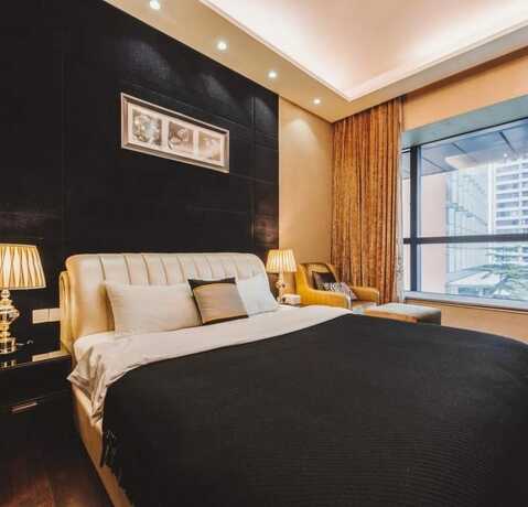 Imagen de la habitación del Hotel Guangzhou Yandw Service Apartment. Foto 20