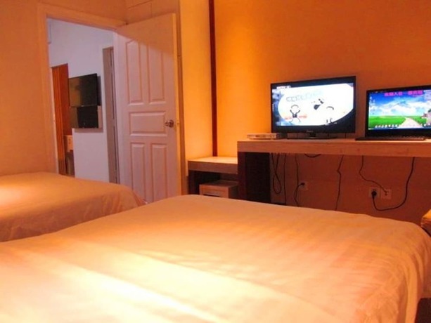 Imagen de la habitación del Hotel Guangzhou Yide. Foto 12