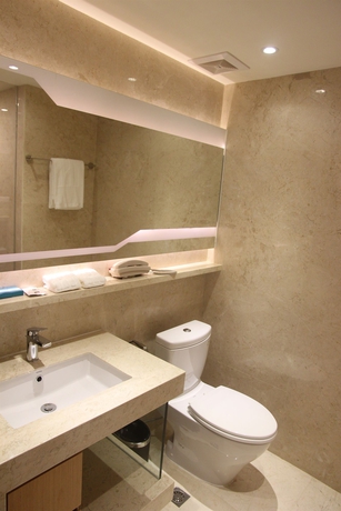 Imagen de la habitación del Hotel Guangzhou Yihe Glory. Foto 10