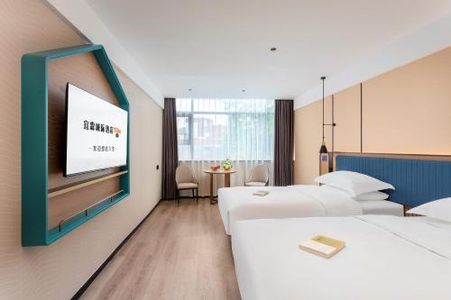 Imagen de la habitación del Hotel Guangzhou Yilin. Foto 17