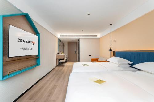 Imagen de la habitación del Hotel Guangzhou Yilin. Foto 18