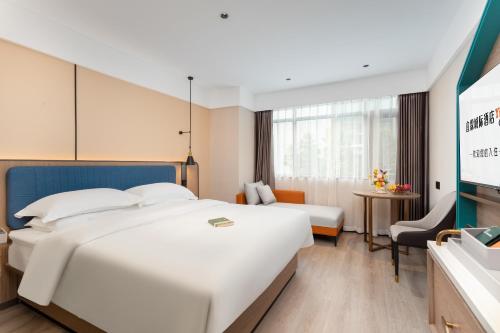 Imagen de la habitación del Hotel Guangzhou Yilin. Foto 20
