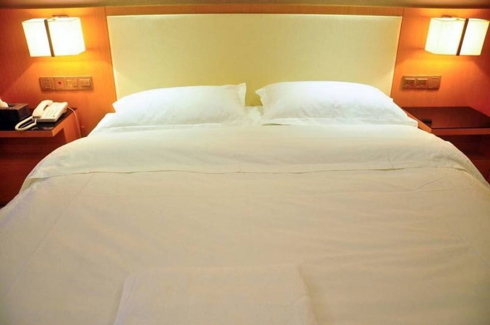 Imagen de la habitación del Hotel Guangzhou Yiyuan Apartment. Foto 3