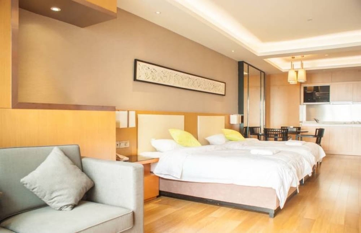 Imagen de la habitación del Hotel Guangzhou Yiyuan Apartment. Foto 6