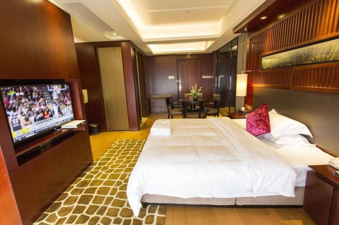 Imagen de la habitación del Hotel Guangzhou Yiyuan Apartment. Foto 9