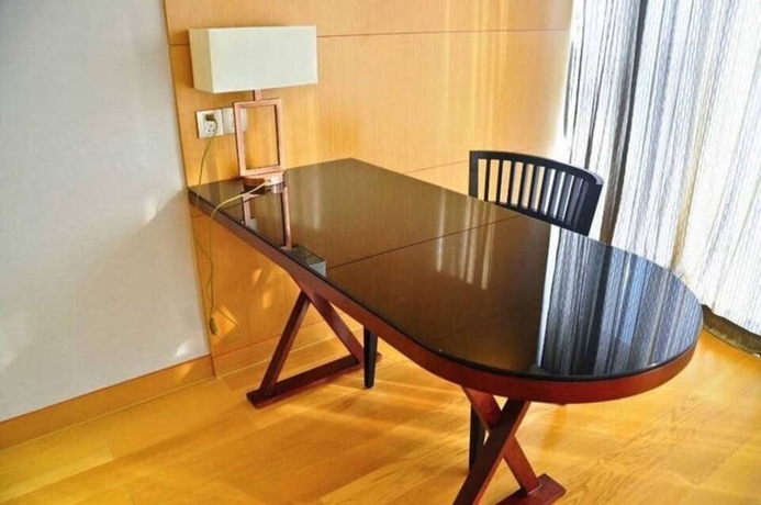 Imagen de la habitación del Hotel Guangzhou Yiyuan Apartment. Foto 17
