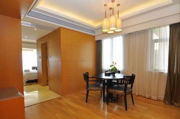Imagen de la habitación del Hotel Guangzhou Yiyuan Apartment. Foto 18