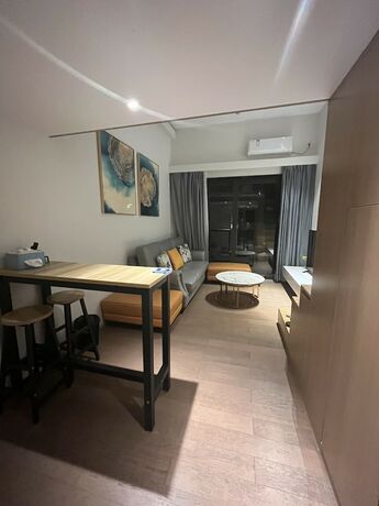 Imagen de la habitación del Hotel Guangzhou Yu Apartment. Foto 20