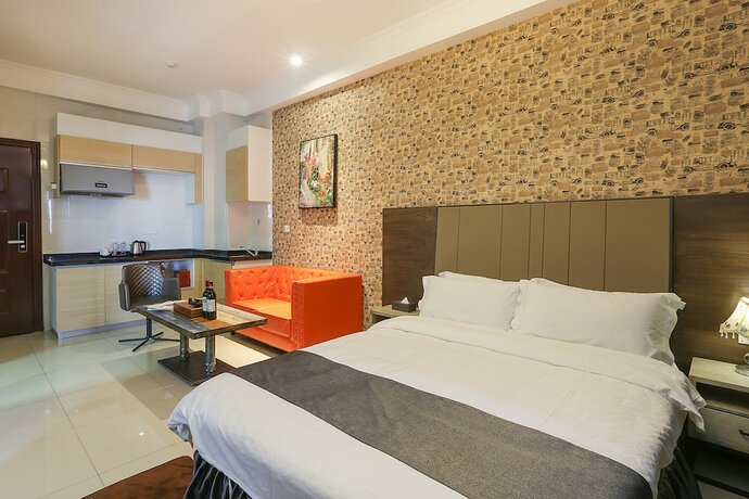 Imagen de la habitación del Hotel Guangzhou Yuting Apartment. Foto 14