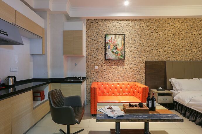 Imagen de la habitación del Hotel Guangzhou Yuting Apartment. Foto 15