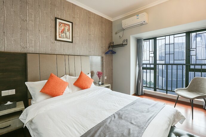 Imagen de la habitación del Hotel Guangzhou Yuting Apartment. Foto 16
