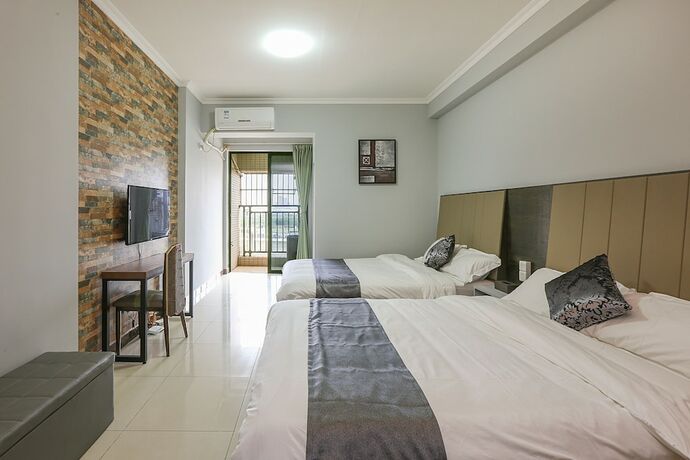 Imagen de la habitación del Hotel Guangzhou Yuting Apartment. Foto 17