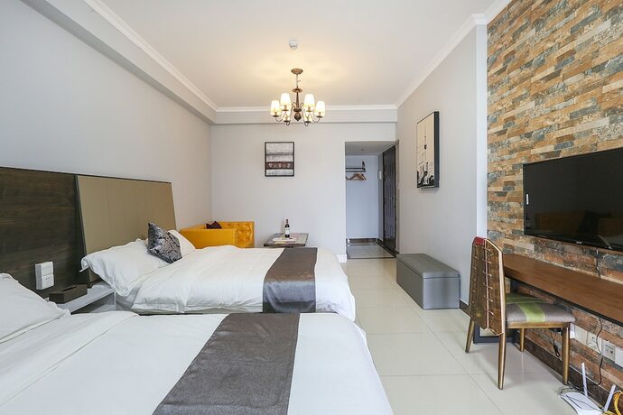Imagen de la habitación del Hotel Guangzhou Yuting Apartment. Foto 18