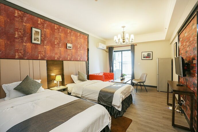 Imagen de la habitación del Hotel Guangzhou Yuting Apartment. Foto 22