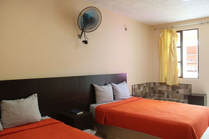 Imagen de la habitación del Hotel Guaranducha Inn. Foto 16