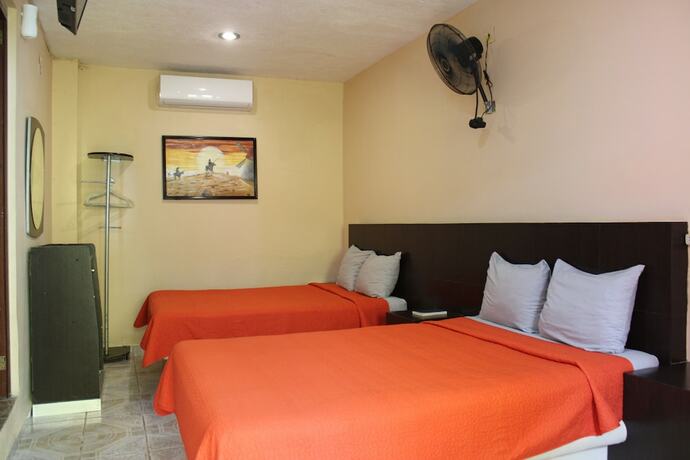 Imagen de la habitación del Hotel Guaranducha Inn. Foto 18