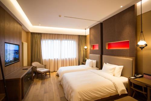 Imagen general del Hotel Gubei Water Town Gubei Zhi Guang Hotspring. Foto 4