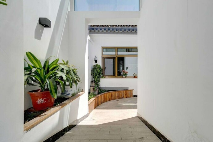 Imagen del bar/restaurante del Hotel Gubei Water Town Revolution. Foto 20