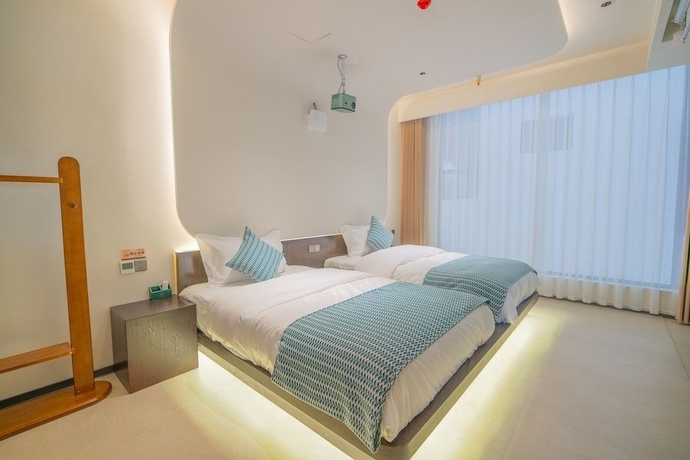 Imagen de la habitación del Hotel Gucheng district ying Xi ting Yu inn. Foto 11