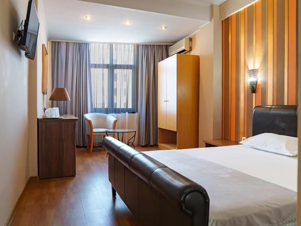 Imagen de la habitación del Hotel Guci. Foto 6