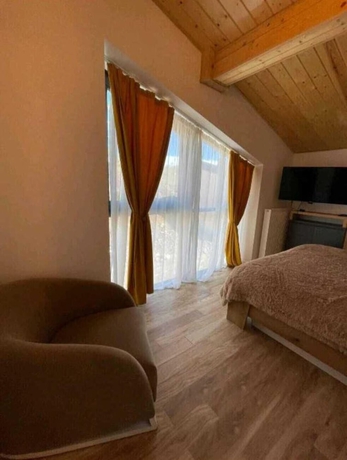 Imagen de la habitación del Hotel Gudauri Winter House. Foto 14