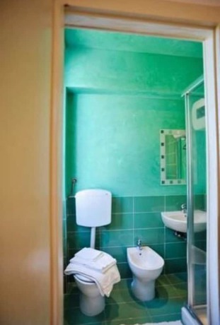 Imagen de la habitación del Hotel Guerrini, Castiglioncello. Foto 11