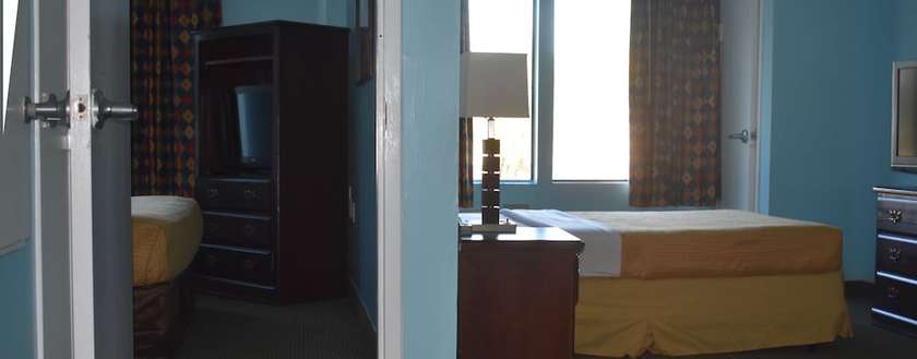 Imagen de la habitación del Hotel Guest Cottage And Suites. Foto 5