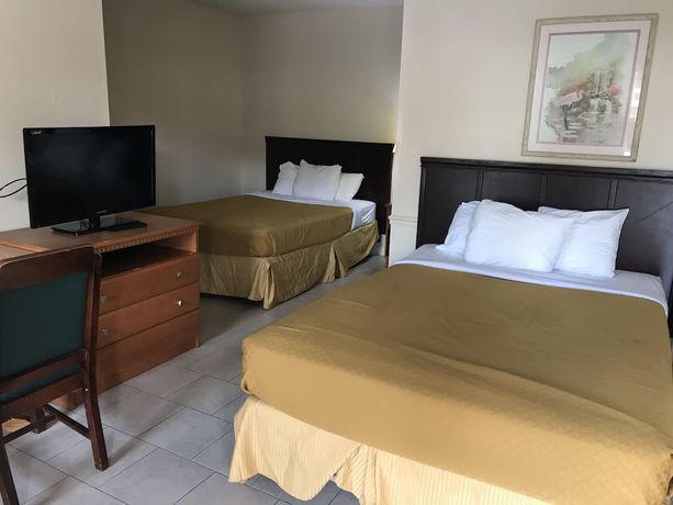 Imagen de la habitación del Hotel Guest Cottage And Suites. Foto 13