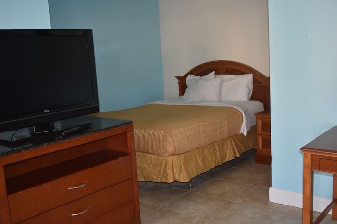 Imagen de la habitación del Hotel Guest Cottage And Suites. Foto 19