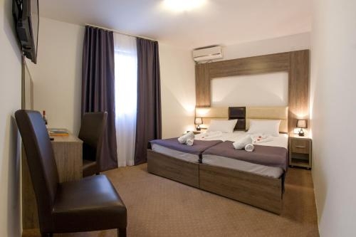 Imagen de la habitación del Hotel Guest House Aria. Foto 7