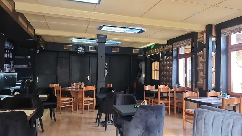 Imagen del bar/restaurante del Hotel Guest House. Foto 9