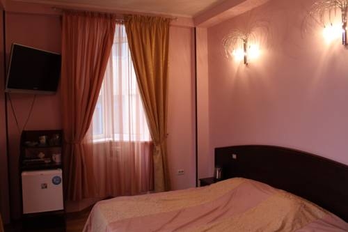 Imagen de la habitación del Hotel Guest House In Sochi Center. Foto 2