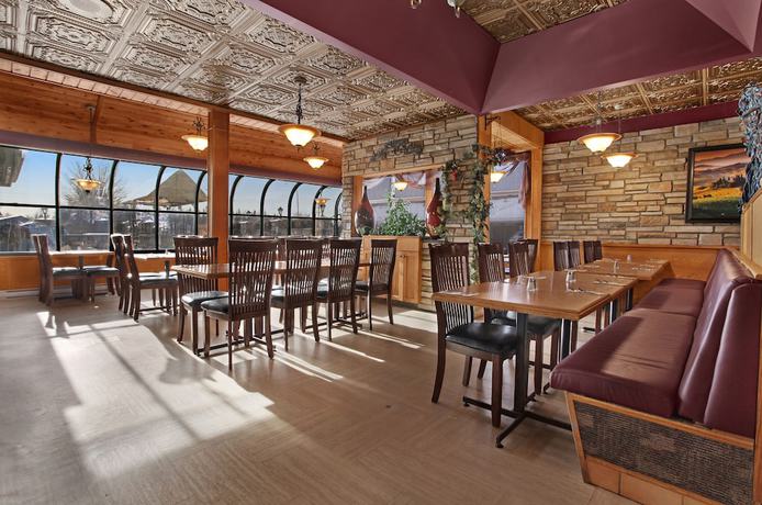 Imagen del bar/restaurante del Hotel Guest House Inn And Suites. Foto 5