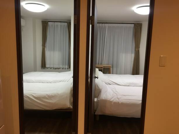 Imagen de la habitación del Hotel Guest House Koiyamacho. Foto 16