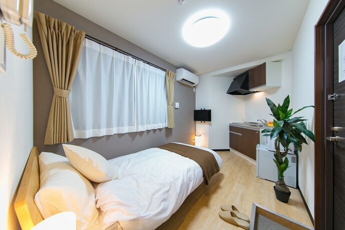 Imagen de la habitación del Hotel Guest House Koiyamacho. Foto 17