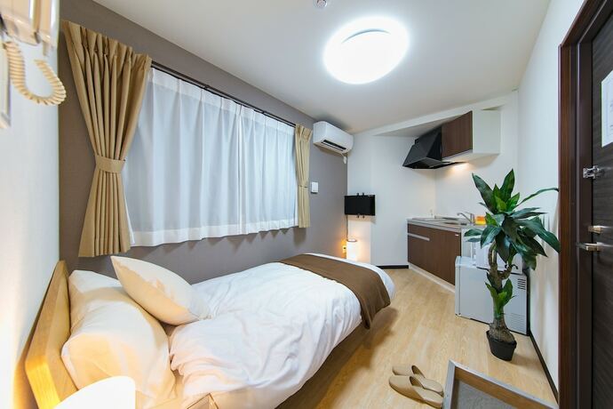 Imagen de la habitación del Hotel Guest House Koiyamacho. Foto 20