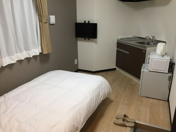 Imagen de la habitación del Hotel Guest House Koiyamacho. Foto 22