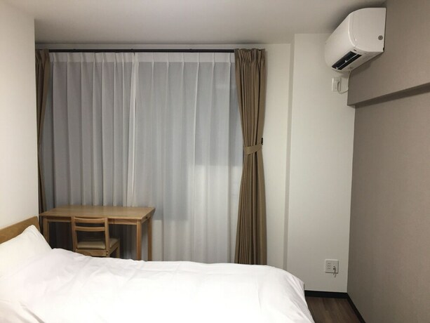 Imagen de la habitación del Hotel Guest House Koiyamacho. Foto 24