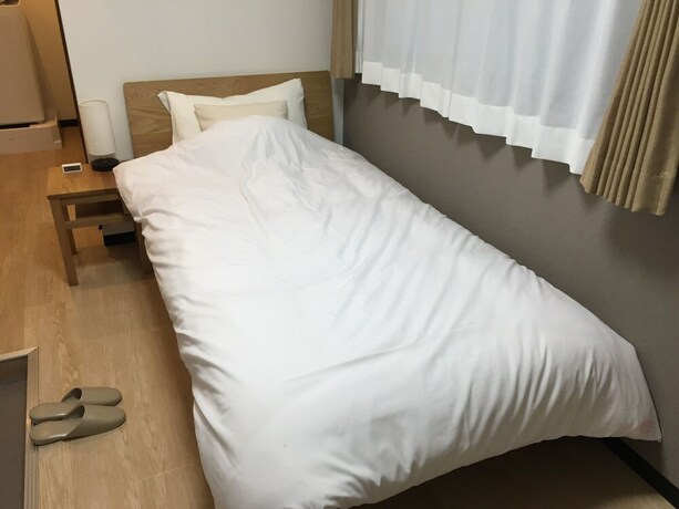 Imagen de la habitación del Hotel Guest House Koiyamacho. Foto 25