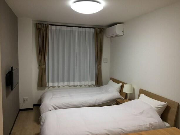 Imagen de la habitación del Hotel Guest House Koiyamacho. Foto 26