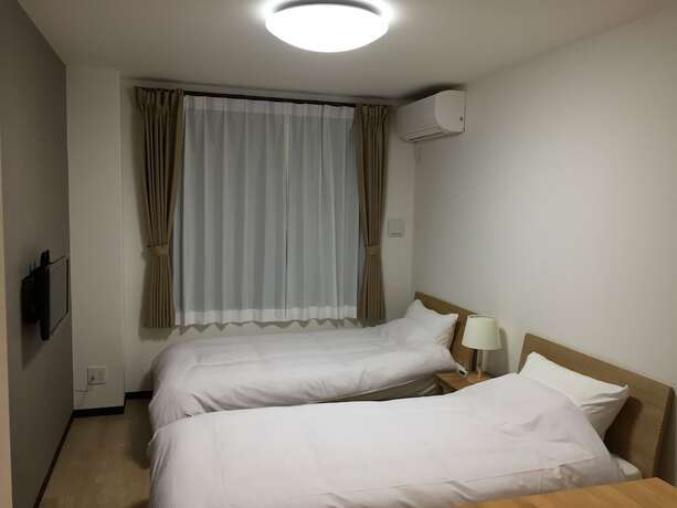 Imagen de la habitación del Hotel Guest House Koiyamacho. Foto 30