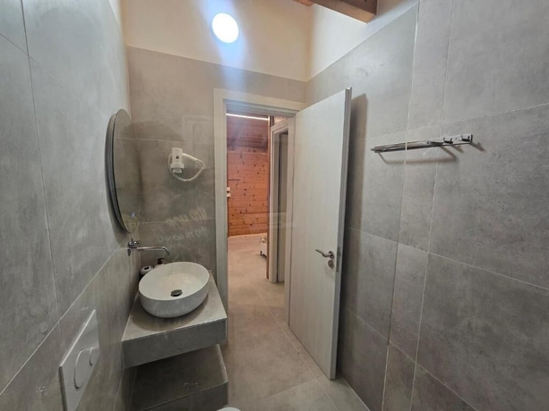 Imagen de la habitación del Hotel Guest House Luiza. Foto 13