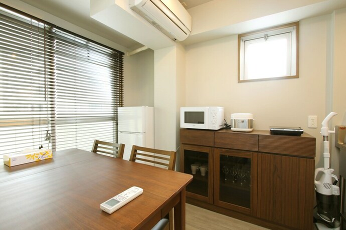 Imagen de la habitación del Hotel Guest House Osaka Tsukamoto. Foto 21