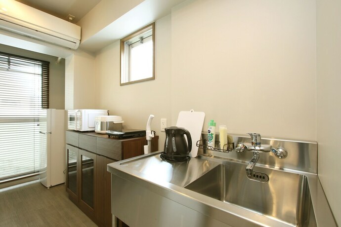 Imagen de la habitación del Hotel Guest House Osaka Tsukamoto. Foto 28